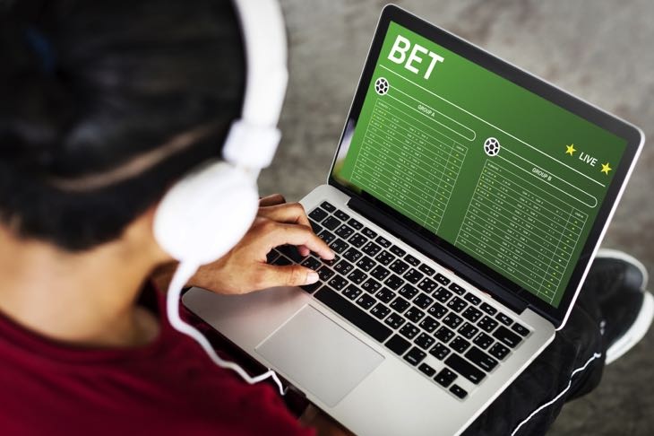 Football bet on laptop