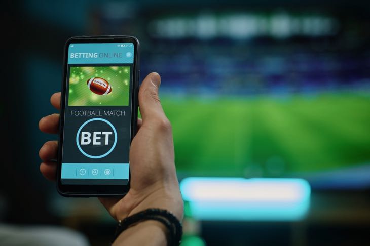 Football bet on phone