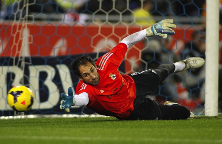 Goalkeeper blocking goal