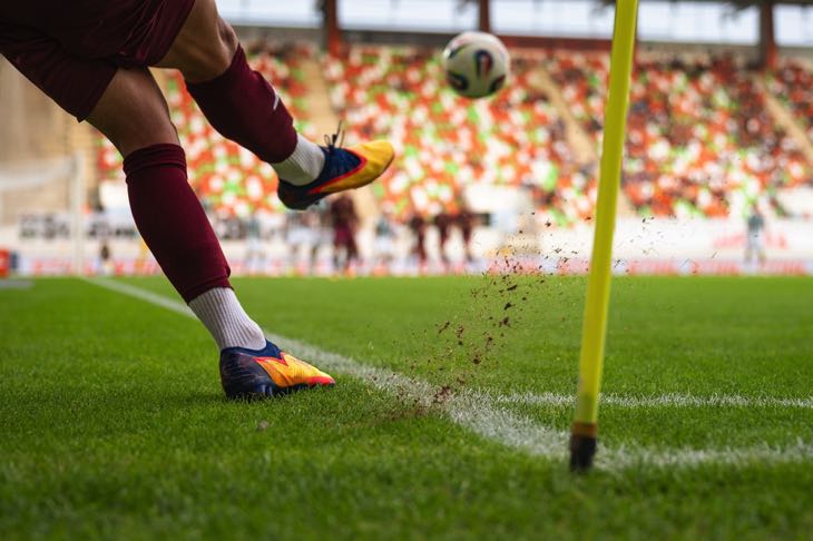 Kicking football from corner