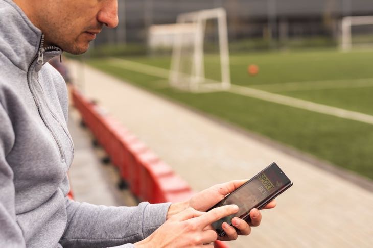 Man betting at stadium