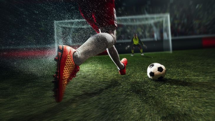 Football player approaching goal