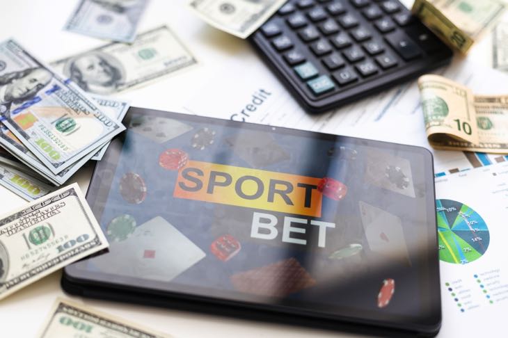 Sports betting calculator and tablet
