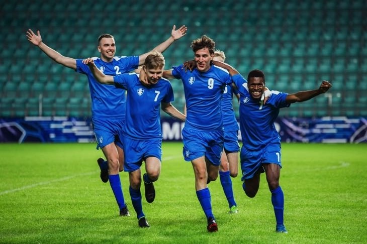 Team celebrating on the field